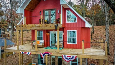 This incredible LAKE HOME, just a little over a year old, offers - photo 45