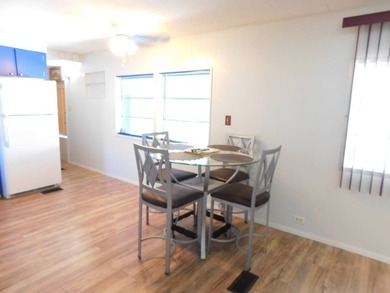 This well-maintained 2-bedroom, 1.5-bathroom home comes - photo 7
