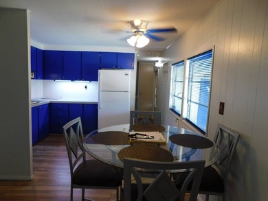 This well-maintained 2-bedroom, 1.5-bathroom home comes - photo 8