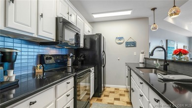 Located at the Lake of the Ozarks, this stunning turnkey 3BR/2BA - photo 11