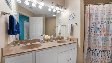 Located at the Lake of the Ozarks, this stunning turnkey 3BR/2BA - photo 12