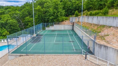 Located at the Lake of the Ozarks, this stunning turnkey 3BR/2BA - photo 17