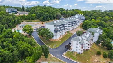 Located at the Lake of the Ozarks, this stunning turnkey 3BR/2BA - photo 19