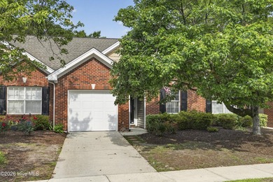 A picturesque landscape of all-brick residences makes this - photo 2