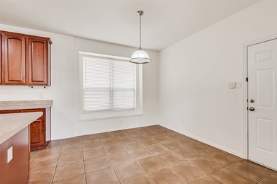 Welcome home to this charming two-story residence featuring a - photo 12