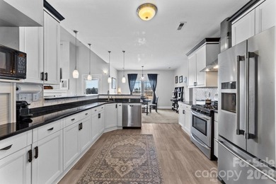 Welcome to 543 Muirfield Way, a stunning residence nestled - photo 15