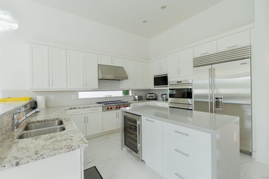 Discover refined luxury living in this exquisitely designed - photo 12