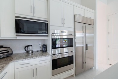 Discover refined luxury living in this exquisitely designed - photo 15
