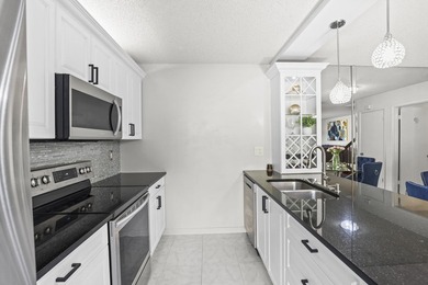 Charming 2-bedroom townhouse with both bedrooms featuring - photo 18