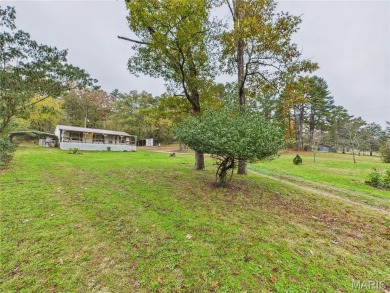 Escape to the country with this 3-bedroom, 2-bathroom