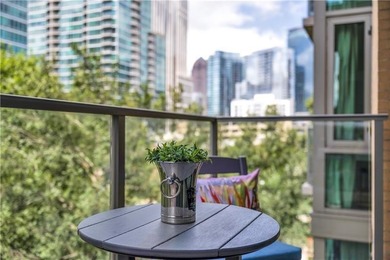 Rare 2-Bedroom + Den | 2 Bath | Two Deeded Parking Spaces +