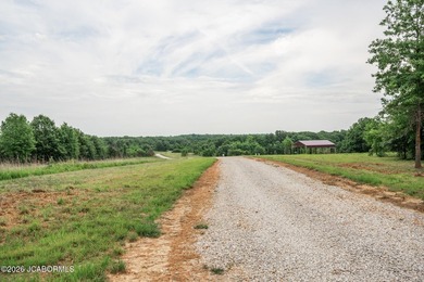 These Mark Twain Lake acreage lots are located along the - photo 8