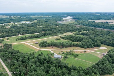 These Mark Twain Lake acreage lots are located along the - photo 3
