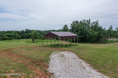 These Mark Twain Lake acreage lots are located along the - photo 7