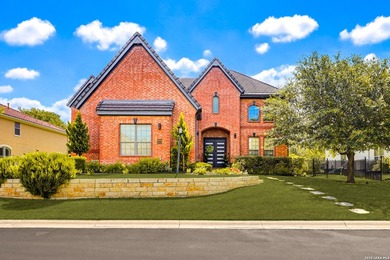 Nestled on a premier corner lot within a quiet cul-de-sac in the - photo 1