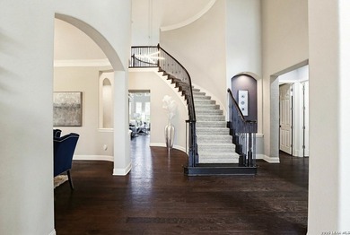Nestled on a premier corner lot within a quiet cul-de-sac in the - photo 2
