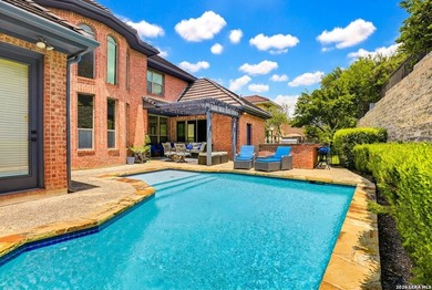 Nestled on a premier corner lot within a quiet cul-de-sac in the - photo 3