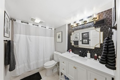 Step into this beautifully spacious 2-bedroom, 2-bath residence