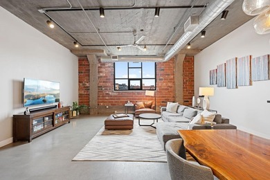 Loft-style living in the North Loop, done right! This oversized - photo 4