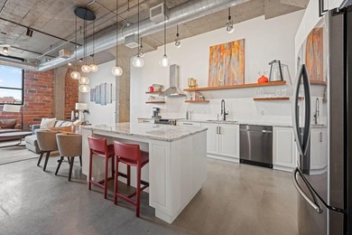 Loft-style living in the North Loop, done right! This oversized - photo 5