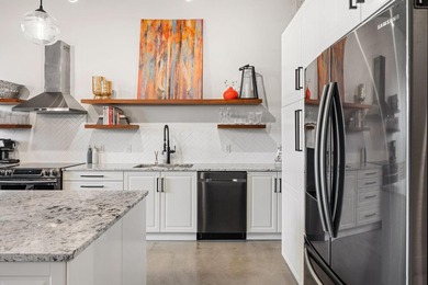 Loft-style living in the North Loop, done right! This oversized - photo 7