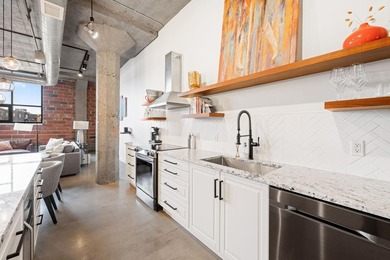 Loft-style living in the North Loop, done right! This oversized - photo 9