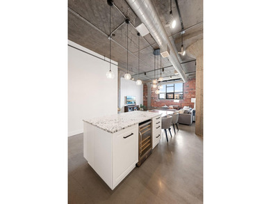 Loft-style living in the North Loop, done right! This oversized - photo 10