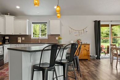 Mornings begin on the private, east-facing back patio, watching - photo 10