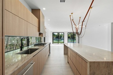 Completely redesigned modern waterfront home in the exclusive - photo 20