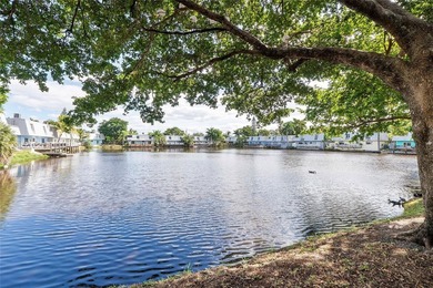 Discover a chic 2-bedroom, 1-bath corner unit condo with - photo 11