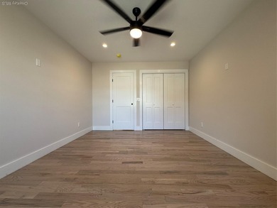 Brand-new custom Cape Cod home offering East End living with a - photo 12