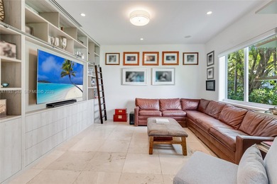 A private tropical oasis--waterfront estate with 150 FT of water