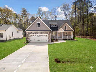 Nestled on a nearly level, highly enjoyable lot within the - photo 1