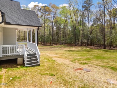 Nestled on a nearly level, highly enjoyable lot within the - photo 2