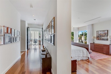 A private tropical oasis--waterfront estate with 150 FT of water