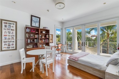 A private tropical oasis--waterfront estate with 150 FT of water