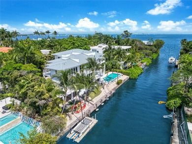 A private tropical oasis--waterfront estate with 150 FT of water