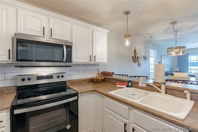 Enjoy large lake views and effortless access at this beautifully - photo 13