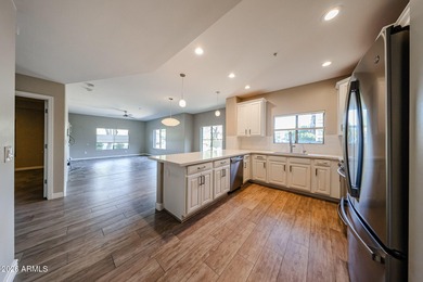 This beautifully remodeled cornerunit 2bed, 2bath condo offers