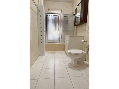 Elmhurst central. Approximately 1,500 SF, 2-bed & 1-bath, Living