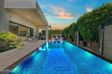 Located within a guard-gated enclave, this Paradise Valley