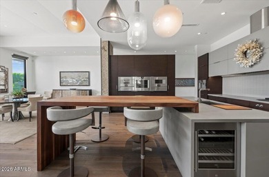 Located within a guard-gated enclave, this Paradise Valley