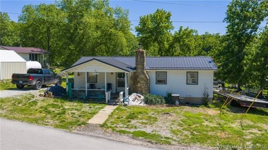 Tucked near the water in Warsaw, this 3-bedroom, 1-bath ranch - photo 19