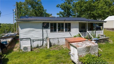 Tucked near the water in Warsaw, this 3-bedroom, 1-bath ranch - photo 21