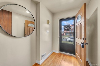 Welcome to this classic, all-brick semi-attached townhouse in - photo 2
