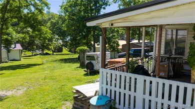 Tucked near the water in Warsaw, this 3-bedroom, 1-bath ranch - photo 23