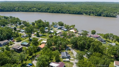 Tucked near the water in Warsaw, this 3-bedroom, 1-bath ranch - photo 24