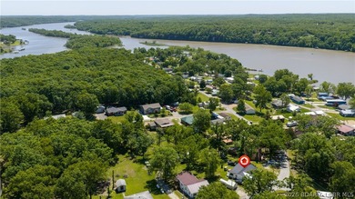 Tucked near the water in Warsaw, this 3-bedroom, 1-bath ranch - photo 25