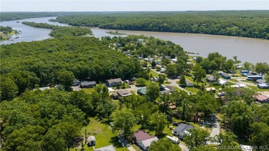 Tucked near the water in Warsaw, this 3-bedroom, 1-bath ranch - photo 26