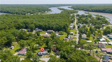 Tucked near the water in Warsaw, this 3-bedroom, 1-bath ranch - photo 27